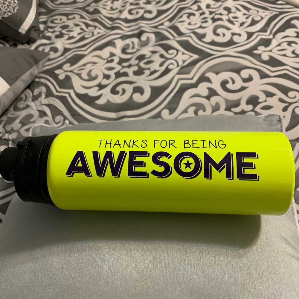 New in the box thermos. Bright yellow. 20oz